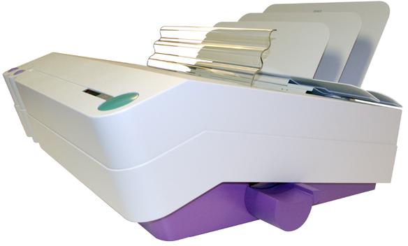 The Powis Parker Model 15 binder was a real innovation at the time. We used stepping motors to replace the complex mechanism used in Xerox Cheshire 750 machine it replaced.